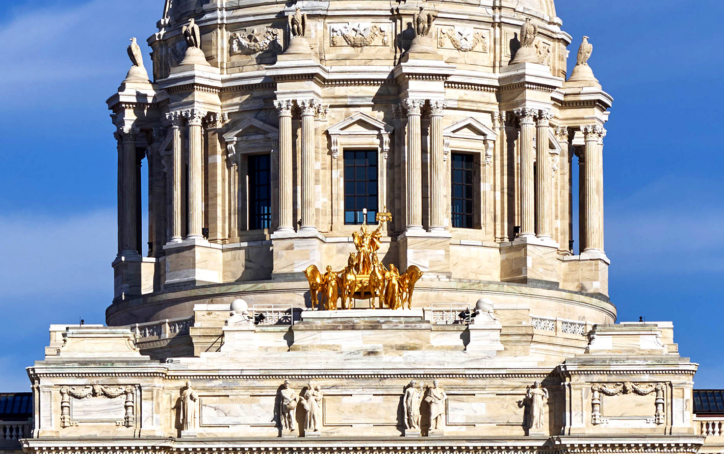 This photo features the golden chariot on the State Capitol's dome. 