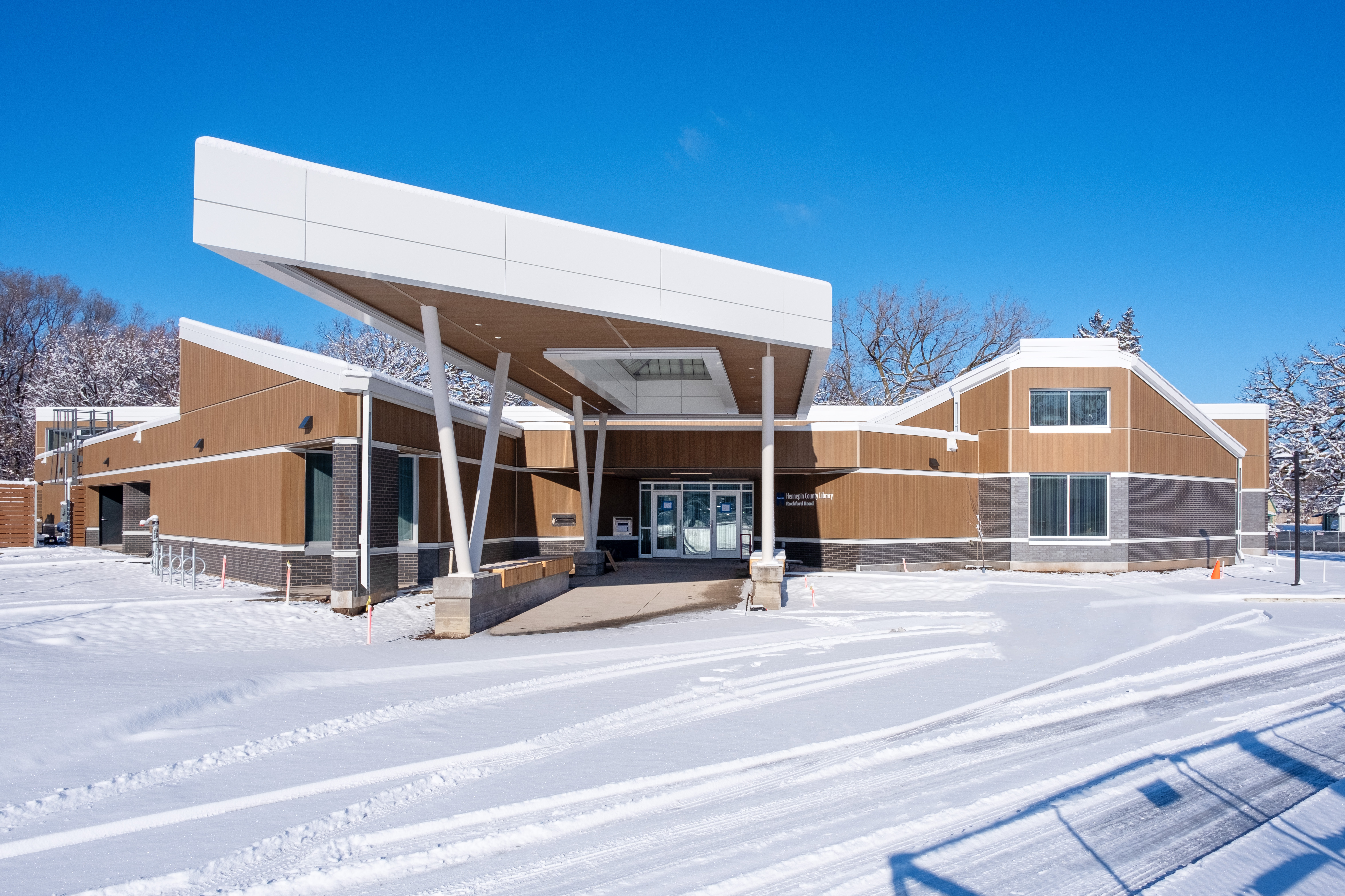 new exterior of rockford road library on a snowy day