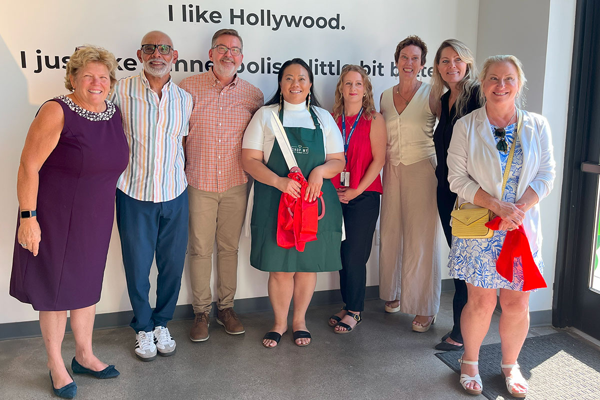 Shop My Closet founder with Elevate Hennepin advisors and staff