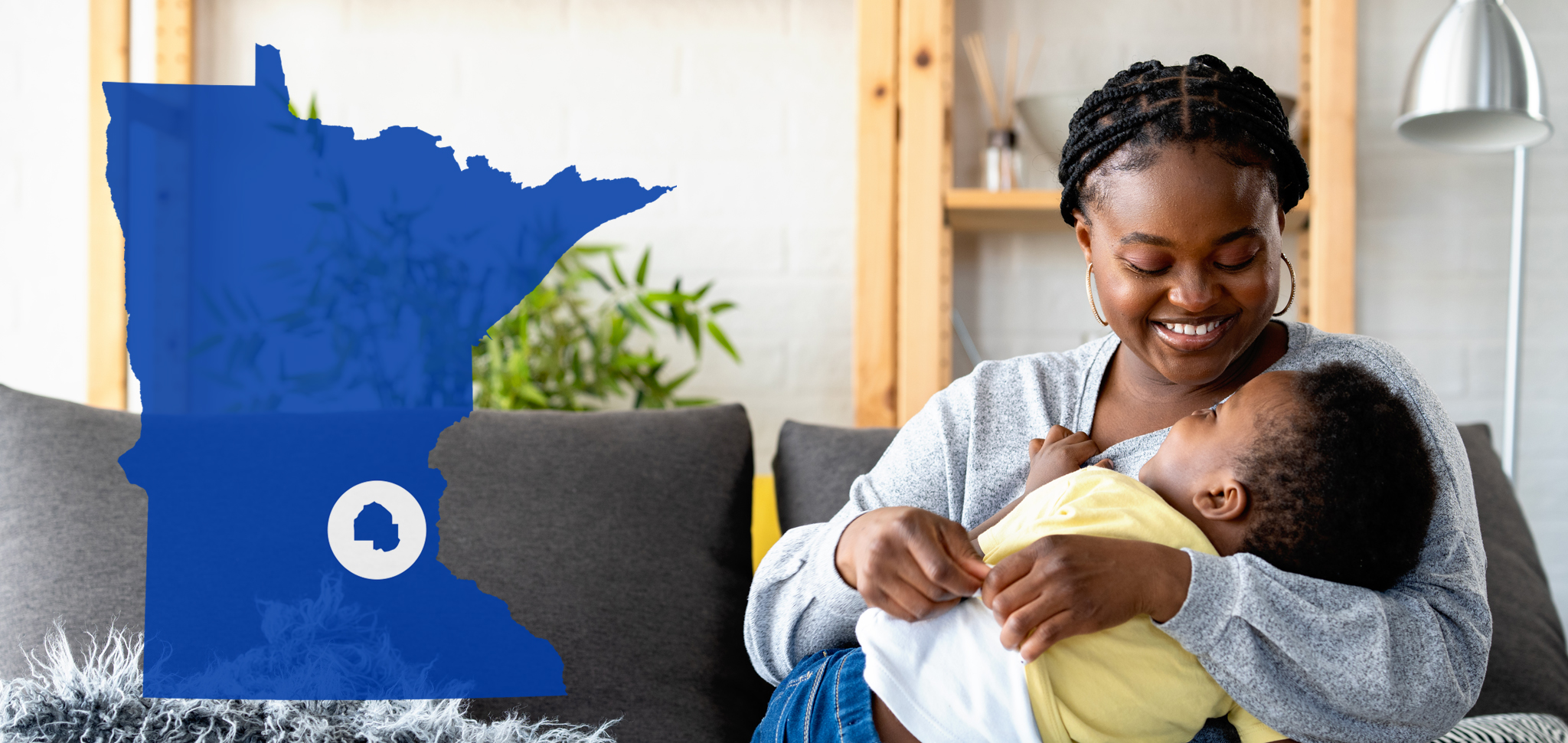 Mother holding baby with MInnesota watermark over photo