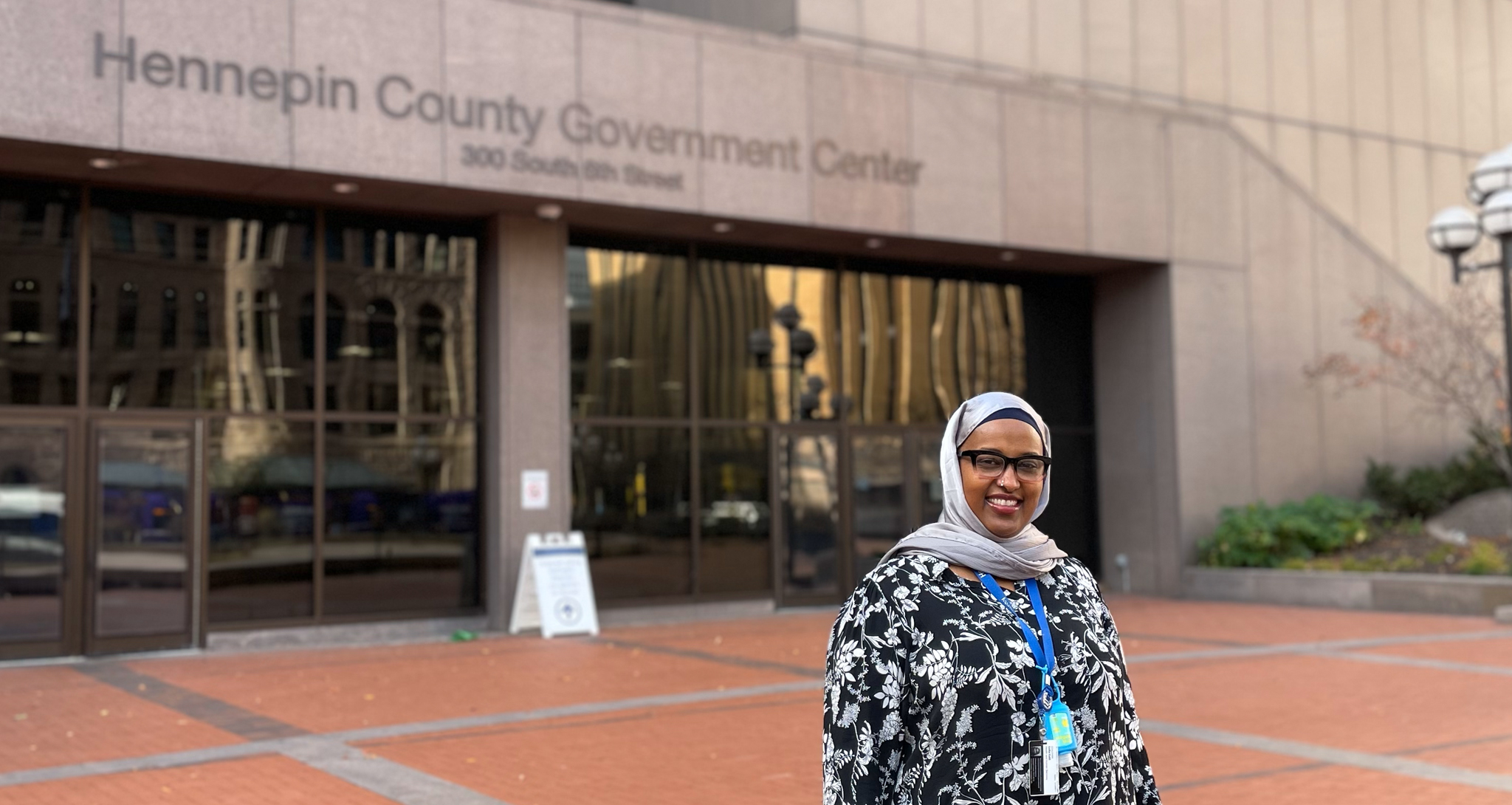Family home visiting nurse outside of Hennepin County Government Center