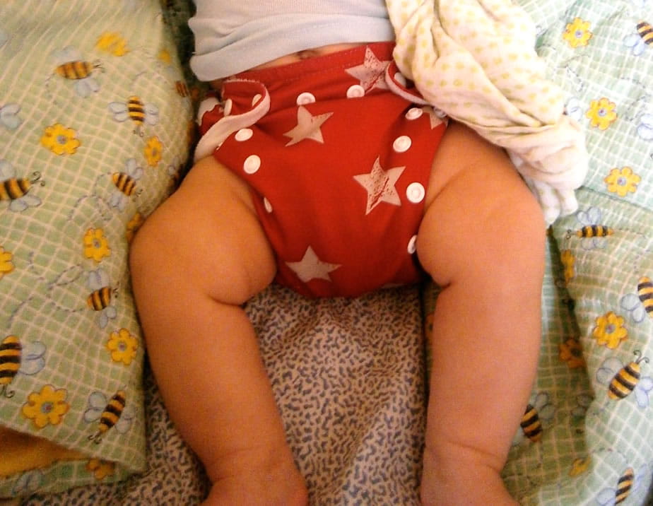 baby wearing a cloth diaper