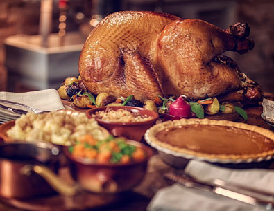 Turkey served on a table of food