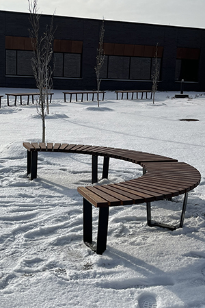 U-shaped wooden bench provided by Wood from the Hood for the new medical examiner facility
