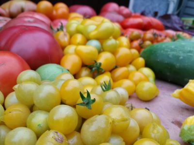 Closeup of yellow cherry tomatoes on a table
