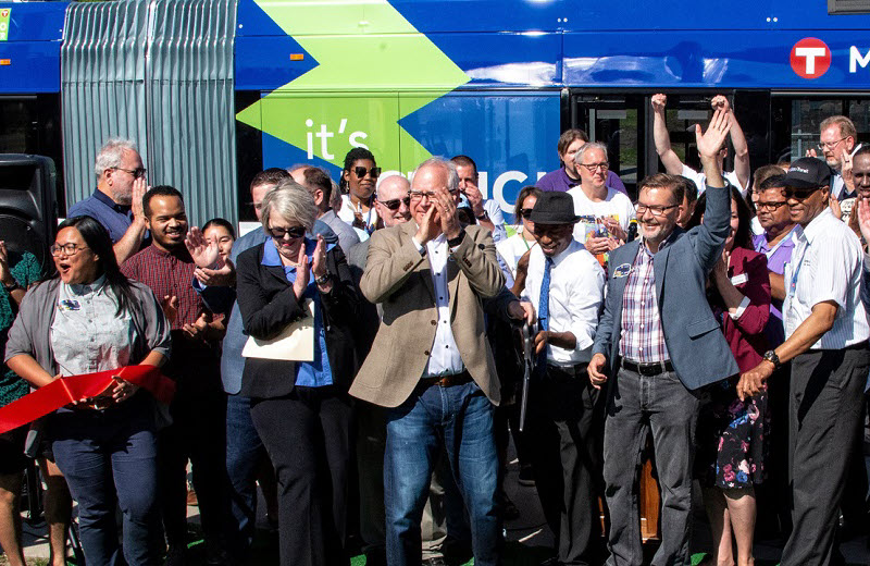State leaders celebrating in front of the C-line