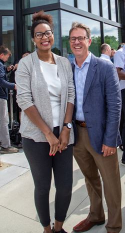 Taylor Smrikárova and Ryan Kelley outside the historic Coliseum Building.