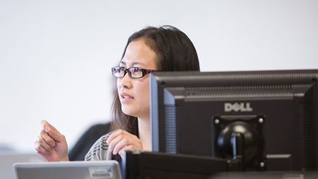 girl working at a computer