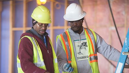 two men at a construction site